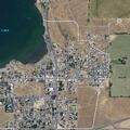 Person experiencing severe back pain at apartment in Soap Lake