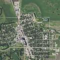 Man sweating with nausea and arm tingling near Main St E