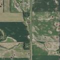 Grass fire near metal garage on Highway 52