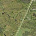 Woman suffering chest pain at highway location
