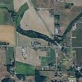 Suspicious person reported in backyard with flashlight
