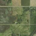 Baler fire spreads to field near Badger