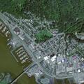 Person looking into vehicles at Harris Harbor