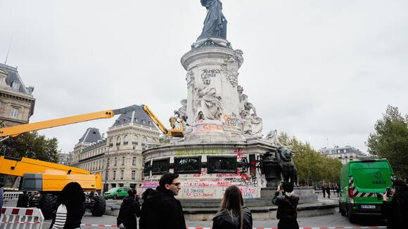 Thousands gather in Paris after a court lifts a protest ban despite fears of new violence