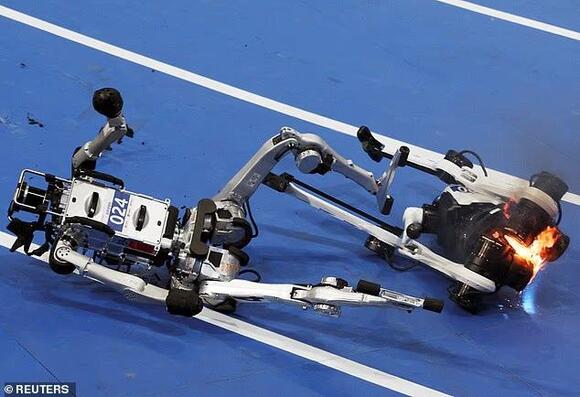 Humanoid robot falls down the stairs after getting distracted by a ...