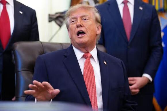Panicking Trump hands reporters printout of Truth Social post about spending $400M