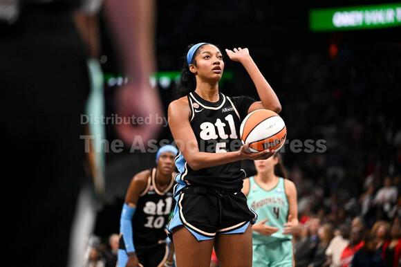 Angel Reese trusted Karl Smesko to change her shot, and it's paying off ...