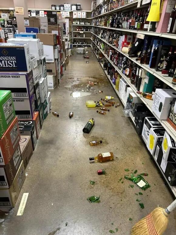 Sooooo, These Pictures Of A Drunk Raccoon Passed Out In A Liquor Store ...