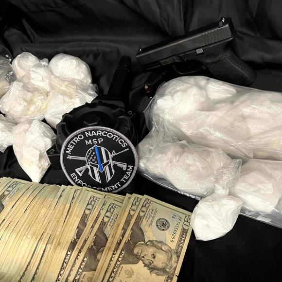 Suspect arrested as Michigan State Police seize drugs, guns and cash ...