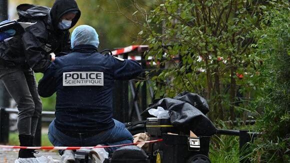 A shooting in the Paris suburbs kills 1 and wounds five in a suspected racist attack