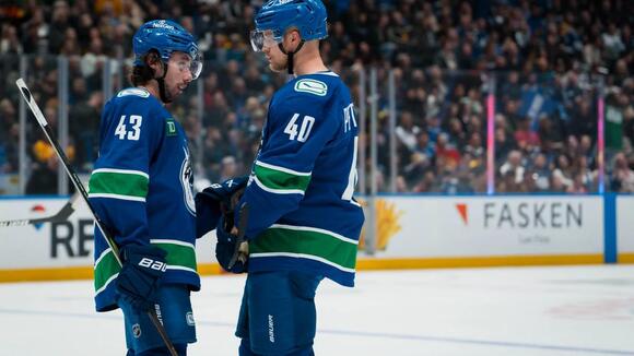 A tense homecoming looms after Elias Pettersson's message about Quinn Hughes