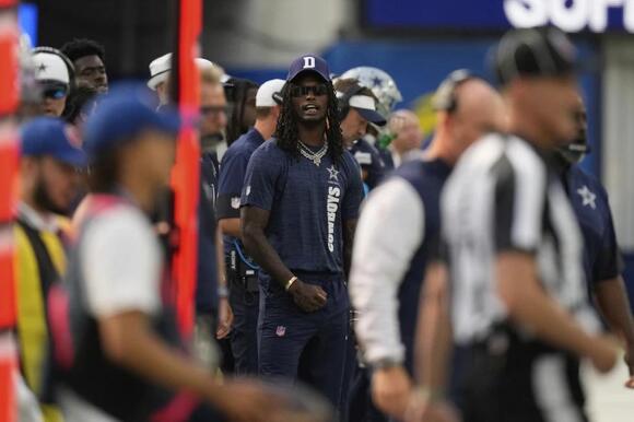 CeeDee Lamb takes big hit from sprinting official while WR is in street  clothes on the sideline - NewsBreak