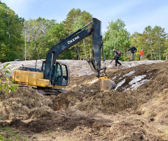 [PHOTOS] Trollhaugen, WI, Uncovers Snow Saved from Last Season for This ...