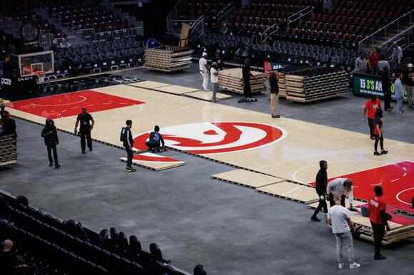 State Farm Arena workers change Dream's WNBA Finals court in time for ...