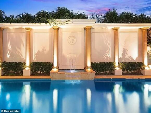 Inside wall-to-wall Versace waterfront mansion with chandeliers ...