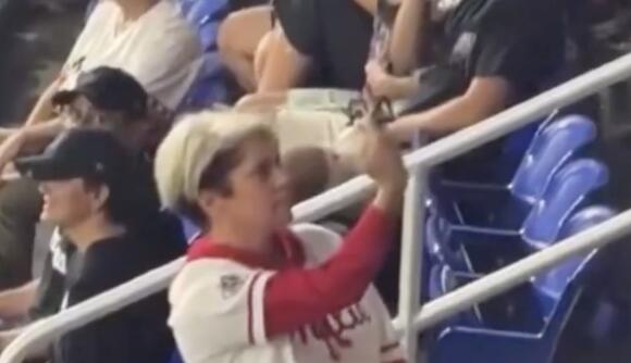 WATCH: 'Phillies Karen' Seen Pitching Another Fit at Heckler, Flipping Off Crowd in New Video - NewsBreak