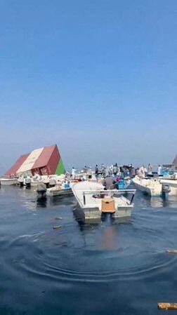 Two ships sink near Hormuz after being hit by projectiles amid surge in ...