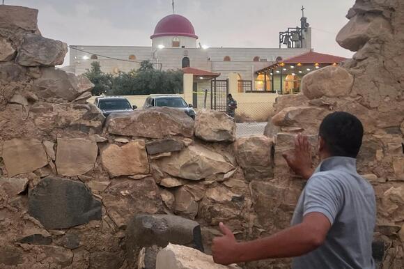 Gunmen open fire at a church during a funeral in Jordan, killing 7 and wounding 40