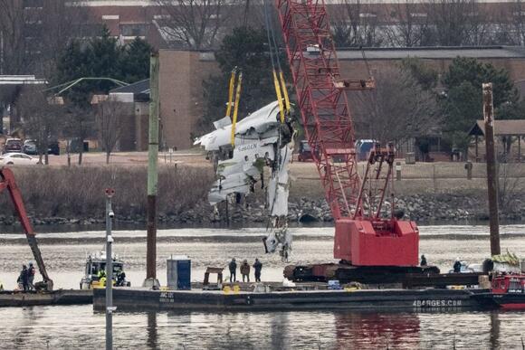Salvage crews lift portion of fuselage of American Airlines plane from ...