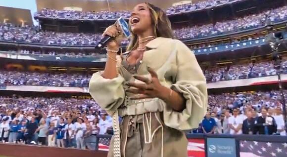 MLB Fans Are Falling In Love After “The Most Beautiful Woman On The Planet” Sang The National Anthem At Game 4 Of The World Series [VIDEO] - NewsBreak
