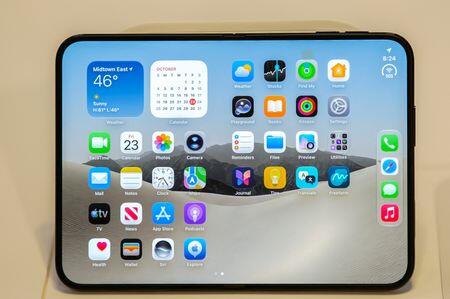 'Truly something cool': Apple fans react as iPhone Duo hits stores ...