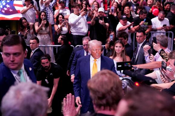 Donald Trump receives hero's welcome at UFC 314 as he's flanked by MAGA  entourage including Elon & granddaughter Kai - NewsBreak
