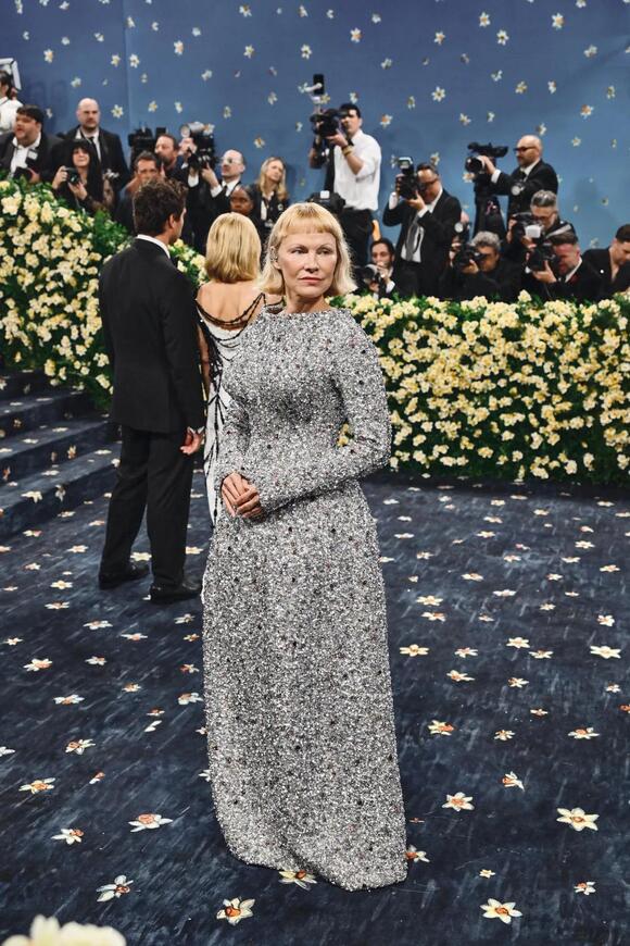 pamela anderson silver dress Pamela Anderson: Unapologetic Glamour at the Met Gala