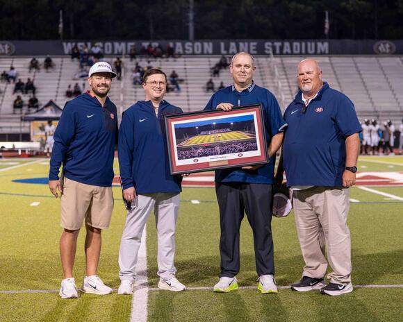Mill Creek honors former principal with Jason Lane Stadium naming ...