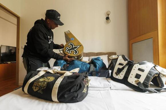 ‘Once in a lifetime’: Saints fans in Paris come from all over to soak in something new
