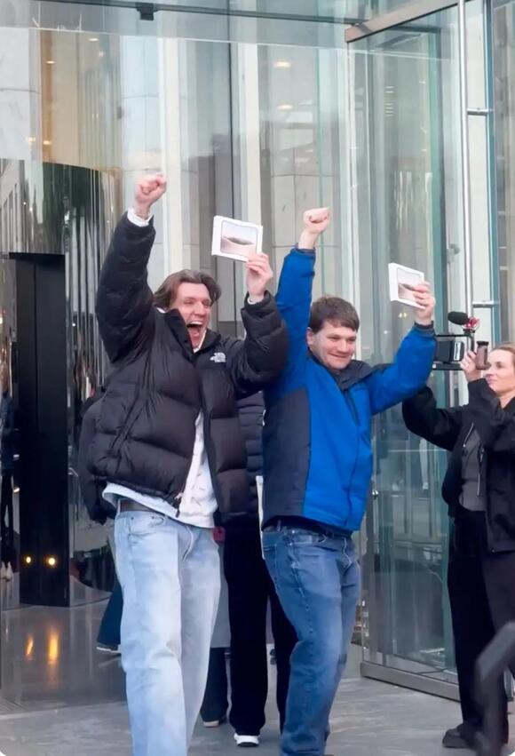 Inside look at Apple mayhem as diehards wait in line for 18 hours for first foldable iPhone at flagship store in NYC
