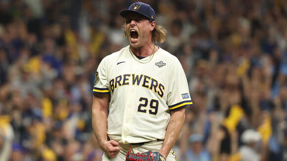 Brewers hold on late to take Game 1 of World Series