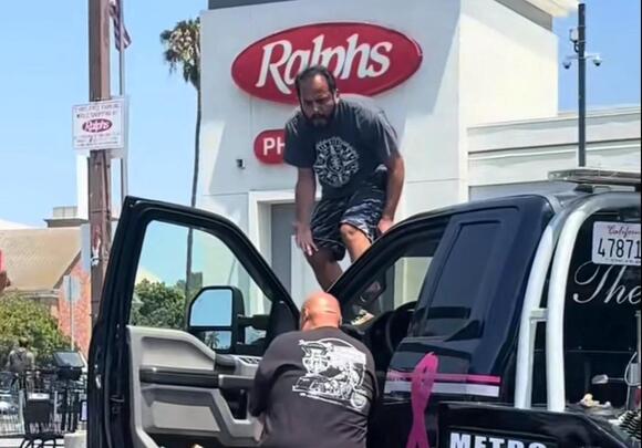 Man Climbs on Top of Tow Truck Outside Koreatown Ralphs in Wild Viral ...