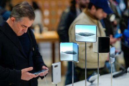 'Truly something cool': Apple fans react as iPhone Duo hits stores ...