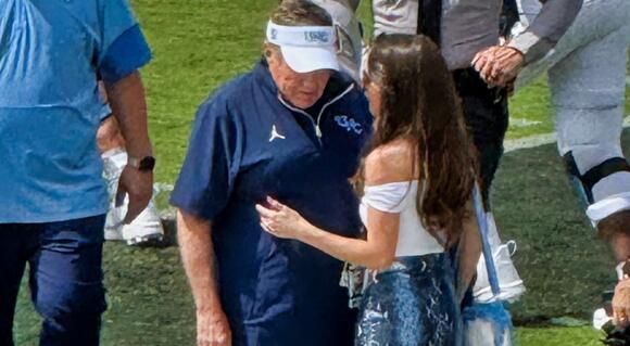 Jordon Hudson Goes Viral in White Knee-High Boots & Tiny Miniskirt While  Chatting with Bill Belichick on the Sideline - NewsBreak