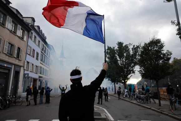 Violence flares in Paris after largely peaceful protests across France