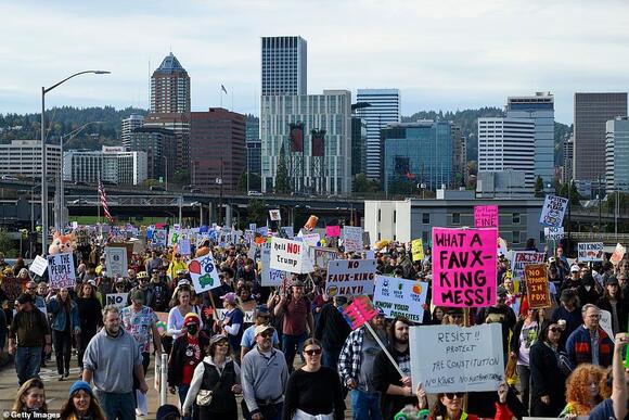 Tear gas fired outside Portland ICE facility at No Kings Day protest ...