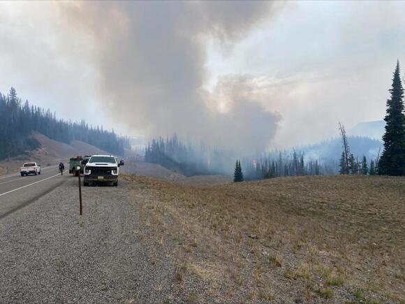 FIRE WATCH: Firefighters work to control spot fires along Highway 26 on ...