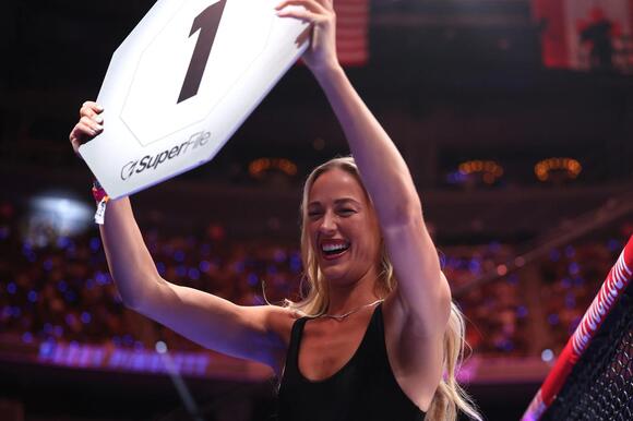 WNBA Star Sophie Cunningham Kicked Off Her Kicks and Went Barefoot for a  Surprise Turn as a UFC Ring Girl, Reigniting Chatter Around Her “MAGA  Barbie” Label - NewsBreak