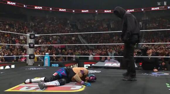 The Mystery Masked Man Strikes Again On WWE RAW - NewsBreak