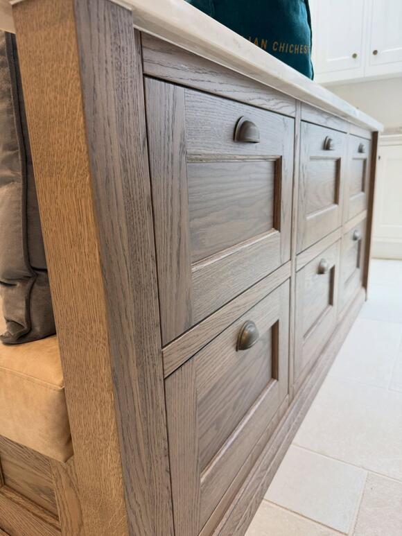 An Oak Kitchen Island Reveals a Curved Seating Nook on the Other Side ...