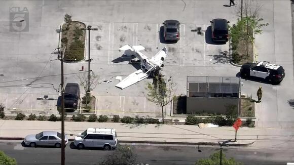 Good Samaritans lift small plane to free pilot after crash into store ...