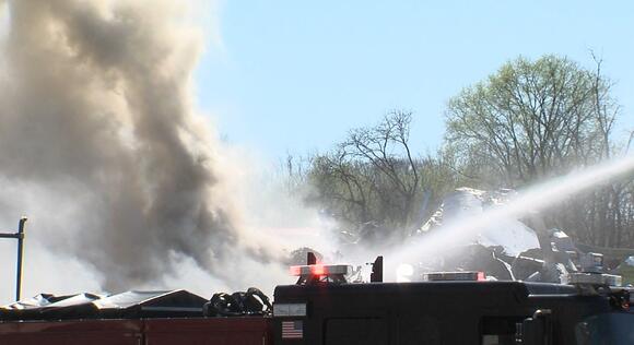Firefighters battle large business fire on Indianapolis’ west side