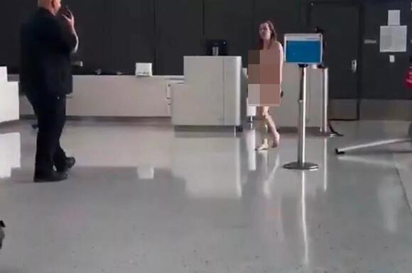 Terrifying moment naked woman has huge meltdown in Dallas Airport: 'I