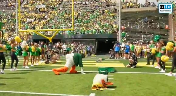 Social Media Explodes Over Insane Viral Video: Oregon Duck Makes Unbelievably Raunchy Gesture To Female Reporter In Wild Segment On Live TV - NewsBreak