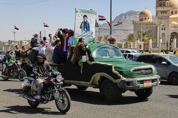 Houthi rebels strike a government military camp in southern Yemen, killing at least 53 fighters
