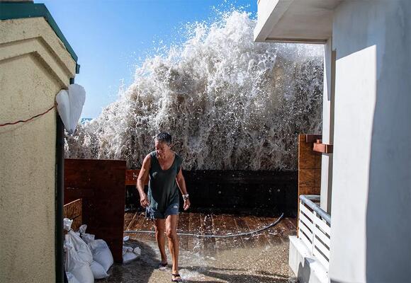As waves push homes to the verge of collapse, city fast-tracks plan to ...