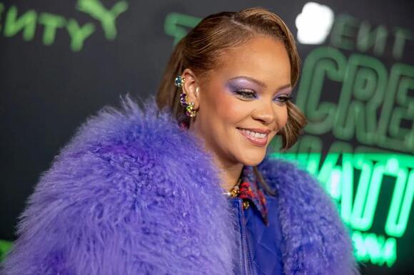 See Rihanna s Purple Fur Other Fab Looks From The Fenty x Puma