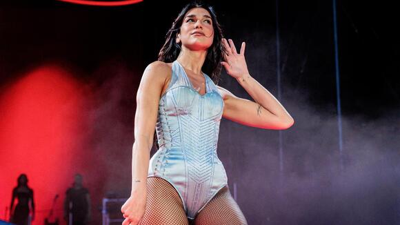 Dua Lipa Goes Braless in Sheer Burgundy Dress for Her Birthday - NewsBreak