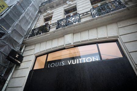 France's luxury stores board up windows ahead of fresh protests