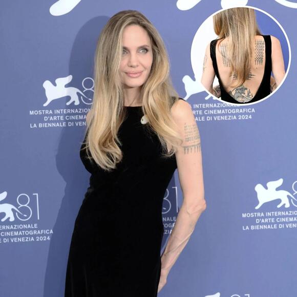 Angelina Jolie Dazzles in Backless Black Gown While Flaunting Tattoos